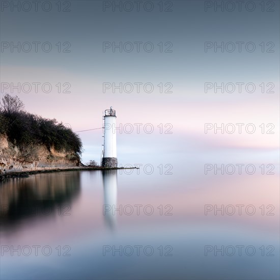 The Maltzien lighthouse stands at the foot of a small cliff at the southern tip of the Zudar peninsula on the island of Ruegen