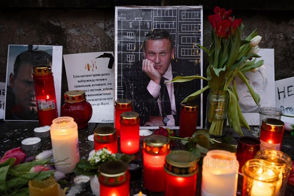 Photos, candles, grave lights and flowers for the Russian opposition leader Alexei Navalny, who died in an Arctic penal colony on 16 February 2024, have been placed on the fence of the closed Consulate General of the Russian Federation in Frankfurt am Main for days. Navalny was a Russian lawyer, anti-corruption activist, dissident and opposition politician. In 2020, he was the victim of a life-threatening poison attack. Politically persecuted and imprisoned from 2021, he was sentenced to many years in prison. He was considered an arch-enemy of Russian President Vladimir Putin, Consulate General of the Russian Federation, Frankfurt am Main, Hesse, Germany, Europe