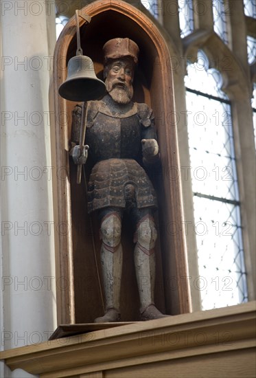 Wooden clock jack figure dated 1682 Holy Trinity church, Blythburgh, Suffolk, England, United Kingdom, Europe