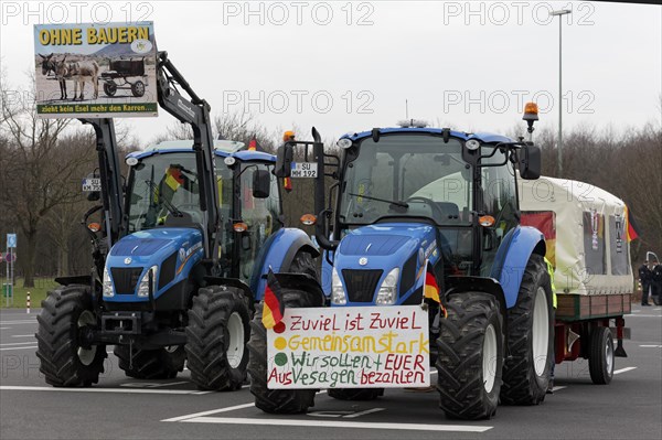 Tractor with sign, Too much is too much, Farmer protests, Demonstration against policies of the traffic light government, Abolition of agricultural diesel subsidies, Duesseldorf, North Rhine-Westphalia, Germany, Europe