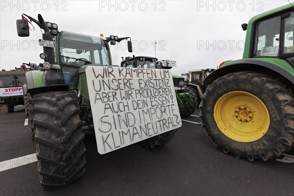 Are imports climate-neutral, placard on a tractor, farmers' protests, demonstration against policies of the traffic light government, abolition of agricultural diesel subsidies, Duesseldorf, North Rhine-Westphalia, Germany, Europe
