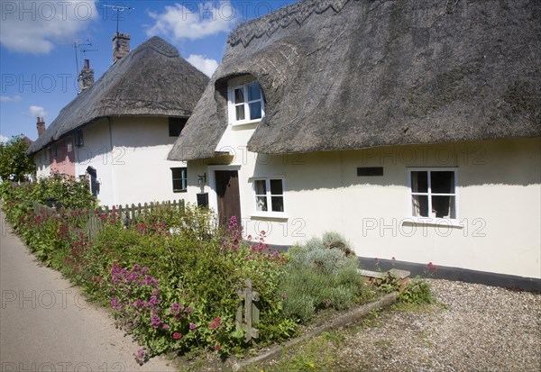 Attractive thatched cottages in the village of Rattlesden, Suffolk, England, United Kingdom, Europe