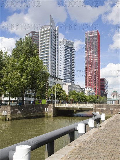 High rise office blocks and Red Apple residential apartments from Scheepmakers Haven, Rotterdam, Netherlands