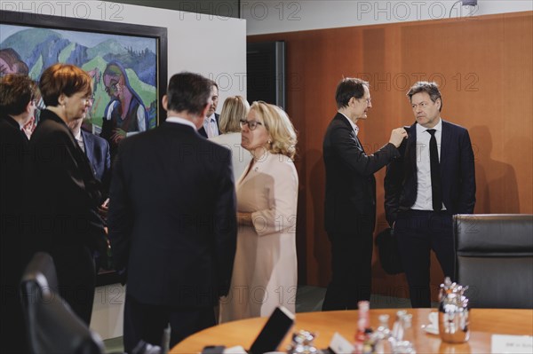 (R-L) Robert Habeck (Alliance 90/The Greens), Federal Minister for Economic Affairs and Climate Protection and Vice-Chancellor, and Karl Lauterbach (SPD), Federal Minister of Health, recorded during the weekly cabinet meeting in Berlin, 21 February 2024