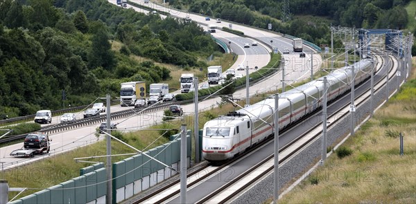 An ICE 1 on the high-speed line for ICE trains next to the A71 motorway near Behringen. The new Leipzig Erfurt line is a high-speed railway line between Erfurt and Nuremberg, 19 June 2018
