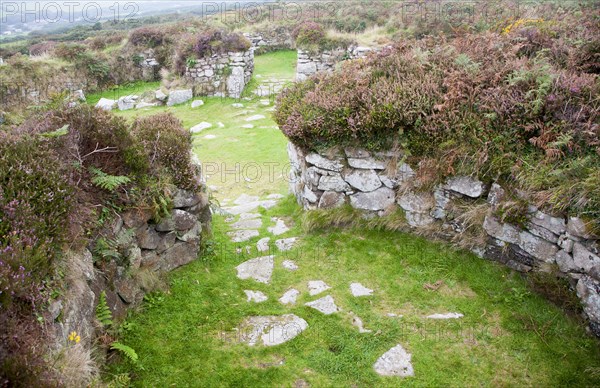 Chysauster Ancient Village is a late Iron Age and Romano-British village of courtyard houses in Cornwall, England, United Kingdom, Europe