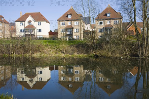 Modern housing development along the River Colne in the town centre, Colchester, Essex, England, United Kingdom, Europe