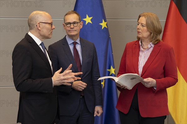 Bundestag President, Baerbel Bas, SPD, accepts the interim report of the Enquete Commission, Lessons from Afghanistan for Germany's future networked engagement, from Michael Mueller, (M) and Peter Beyer, CDU, (L) . Berlin, 20 February 2024