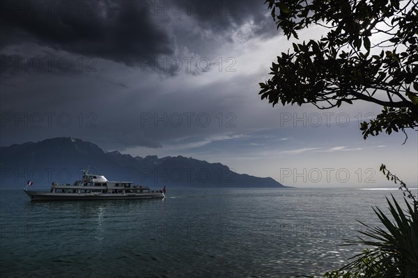 Lake Geneva, thunderstorm, summer, rain, dramatic, dark sky, weather, palm tree, climate boat, excursion steamer, travel, holiday, Alps, Montreux, Vaud, Switzerland, Europe