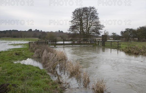 Flooding on the River Deben at Naunton Hall weir, Rendlesham, Suffolk, England in late December 2012
