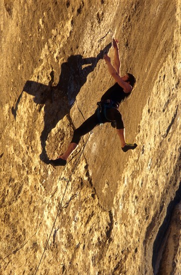 Climber in route called La Rose et le Vampir, 8b, in Buoux, Haute Provence, France, vintage, retro, Europe