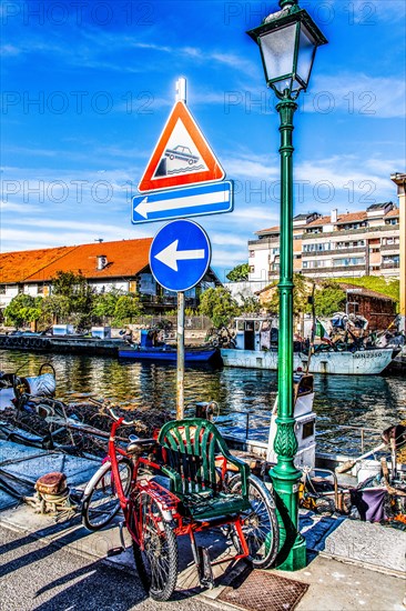 Self-built wheelchair, in the harbour, island of the lagoon town of Grado, northern Adriatic coast, Friuli, Italy, Grado, Friuli, Italy, Europe