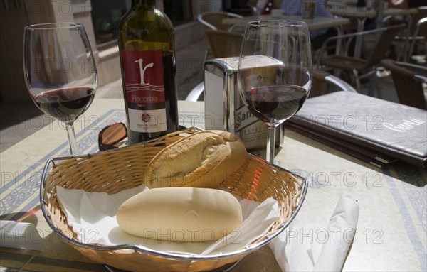 Wine and bread on restaurant table in Ronda, Spain, Europe