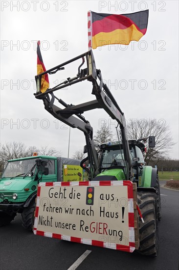 Tractor with sign, Not our government, Farmer protests, Demonstration against policies of the traffic light government, Abolition of agricultural diesel subsidies, Duesseldorf, North Rhine-Westphalia, Germany, Europe