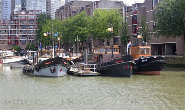 Historic ships and boats in the Haven museum in Leuvehaven dock, Rotterdam, Netherlands
