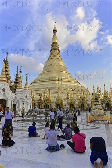 Pilgrims in the Shwedagon Pagoda, Yangon, Myanmar, Asia