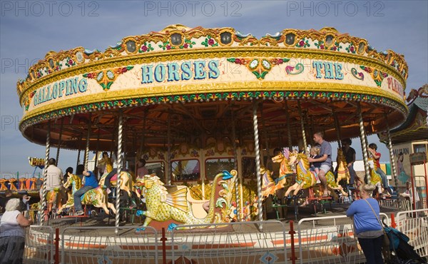 Galloping Horse traditional fairground carousel ride, Great Yarmouth, Norfolk, England, United Kingdom, Europe