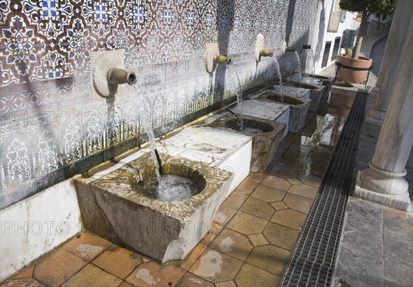 Moorish water fountain in the Andalucian village of Alcaucin, Malaga province, Spain, Europe