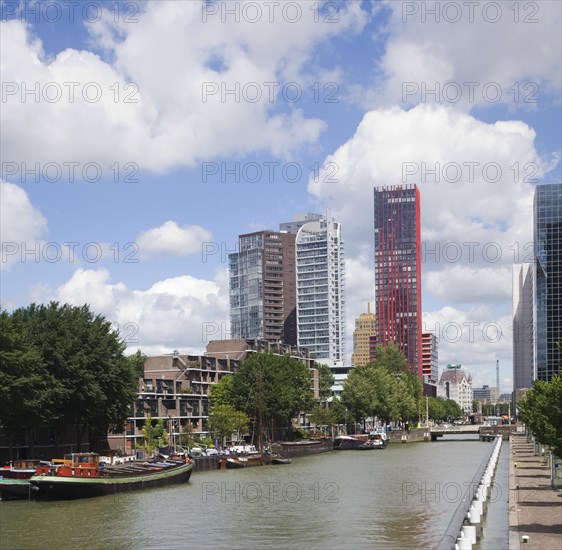 High rise office blocks and Red Apple residential apartments from Scheepmakers Haven, Rotterdam, Netherlands