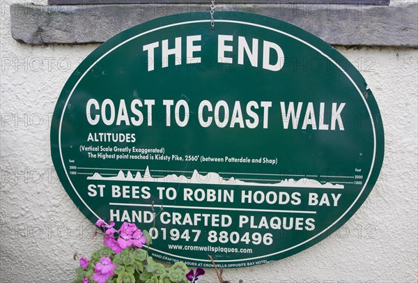 Sign showing the end of the Coast to Coast walk from St Bees to Robin Hoods Bay, England, United Kingdom, Europe