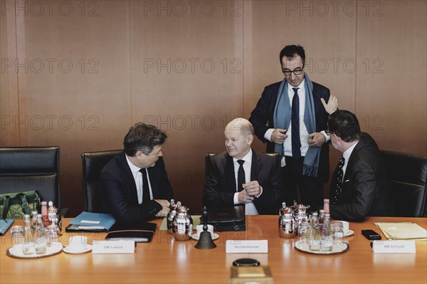 (L-R) Robert Habeck (Alliance 90/The Greens), Federal Minister for Economic Affairs and Climate Protection and Vice-Chancellor, Olaf Scholz (SPD), Federal Chancellor, Cem Oezdemir (Alliance 90/The Greens), Federal Minister for Agriculture and Food, and Wolfgang Schmidt (SPD), Head of the Federal Chancellery, pictured during the weekly cabinet meeting in Berlin, 21 February 2024