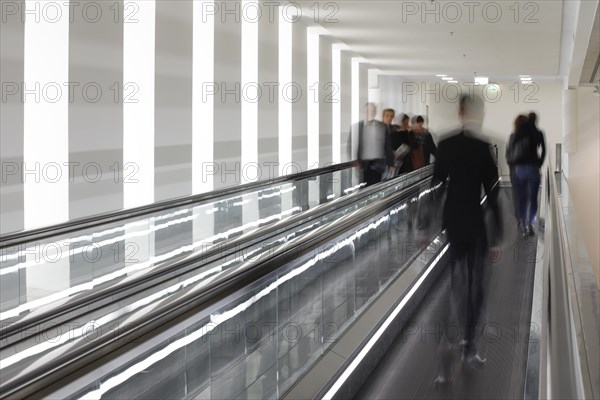 Members of the German Bundestag run across a treadmill between the Reichstag and Paul Loebe Haus, Berlin, 13 November 2018