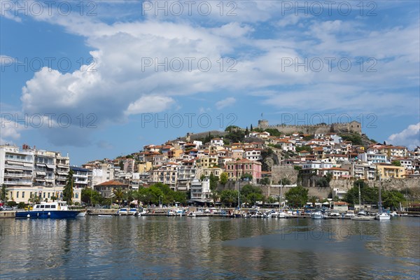 View of a Mediterranean coastal town with a fortress on a hill and boats at the pier, Old Town, Kavala, Dimos Kavalas, Eastern Macedonia and Thrace, Gulf of Thasos, Gulf of Kavala, Thracian Sea, Greece, Europe