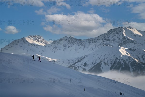 Snowshoe hiking in the Beverin nature park Park, Graubuenden, Switzerland, Europe