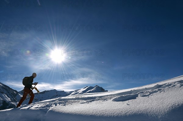 Snowshoe hiking in the Beverin nature park Park, Graubuenden, Switzerland, Europe