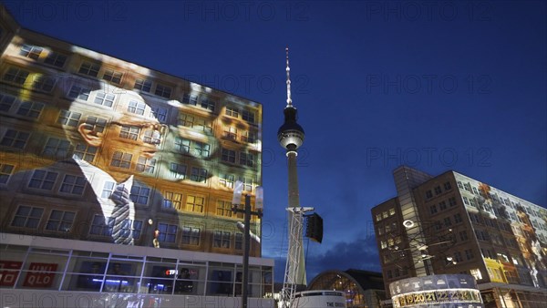 On the 30th anniversary of the fall of the Wall, 3D video projections of historical images and videos commemorate the events of the Peaceful Revolution and the opening of the Wall at original locations, such as here at Berlin's Alexanderplatz Erich honecker, 06.11.2019