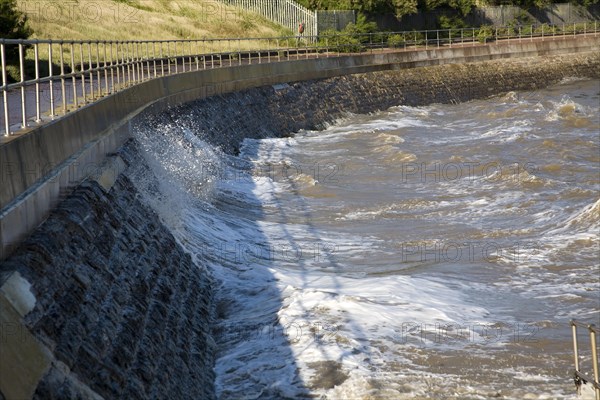 Waves reaching the sea wall at Dovercourt, Harwich, Essex, England, United Kingdom, Europe