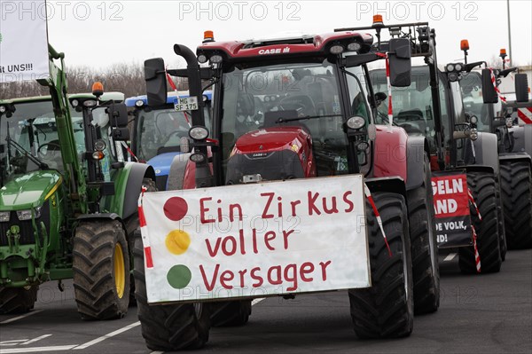 Tractor with sign, A circus full of losers, Farmer protests, Demonstration against policies of the traffic light government, Abolition of agricultural diesel subsidies, Duesseldorf, North Rhine-Westphalia, Germany, Europe