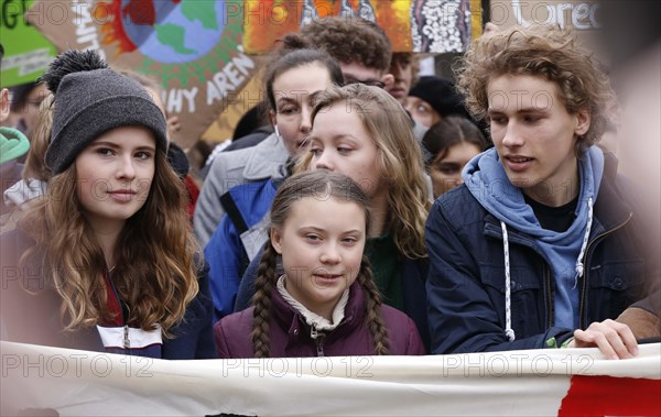 Climate activists Luisa Marie Neubauer (left) and Greta Thunberg demonstrate with thousands of students in Berlin during a Friday for Future demo for the fight against global warming, 29 March 2019