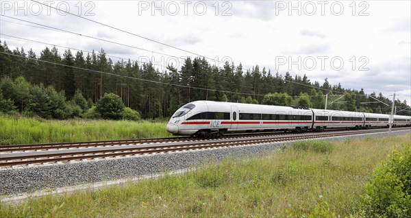 An ICE T train passes through the Tuehringer Forest near Wolfsberg. The new Leipzig Erfurt line is a high-speed railway line between Erfurt and Nuremberg, 19 June 2018