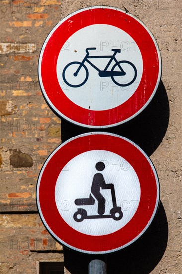 Old town signs against bicycles and e-scooters, Grado Island, north coast of the Adriatic, Friuli, Italy, Grado, Friuli, Italy, Europe