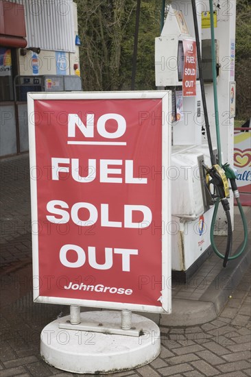 No Fuel Sold Out sign on petrol pumps in John Grose garage, Melton, Suffolk, England, United Kingdom, Europe