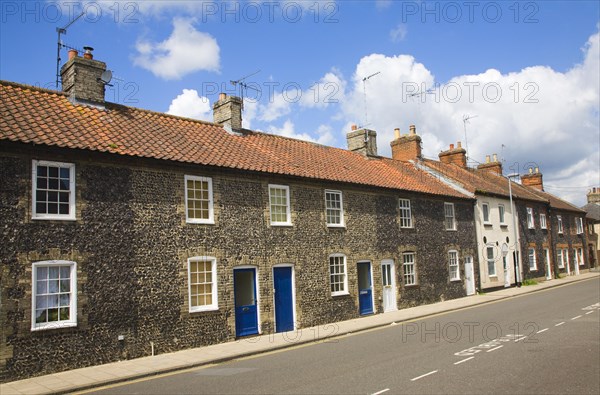 Small row of terraced houses faced with flint, Thetford, Norfolk, England, United Kingdom, Europe