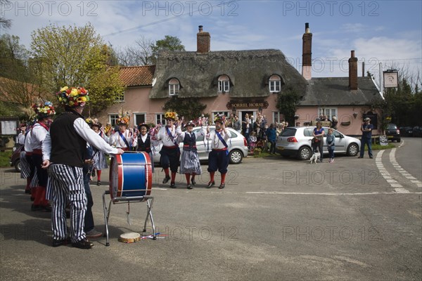 Traditional Morris Men doing country dancing in the village of Shottisham, Suffolk, England, United Kingdom, Europe
