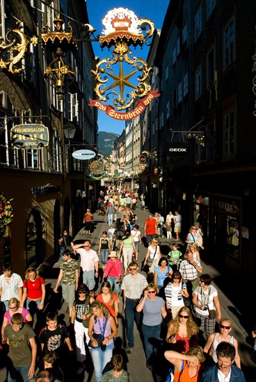 Group of tourists strolling in Getreidegasse, Salzburg, Austria, Europe