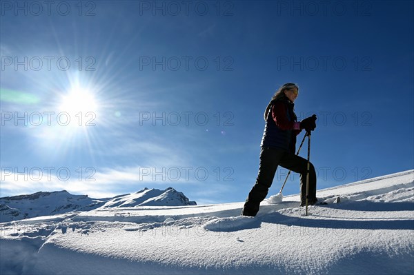 Snowshoe hiking in the Beverin nature park Park, Graubuenden, Switzerland, Europe