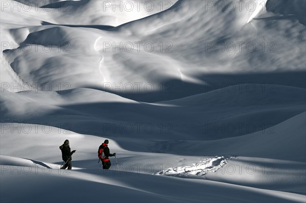 Snowshoe hiking in the Beverin nature park Park, Graubuenden, Switzerland, Europe