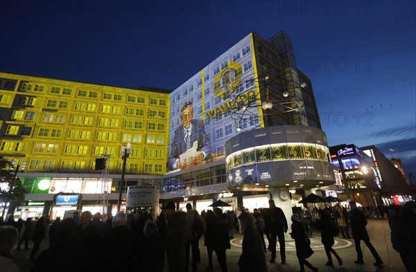 On the 30th anniversary of the fall of the Berlin Wall, 3D video projections of historical images and videos commemorate the events of the Peaceful Revolution and the opening of the Wall at original locations, such as here at Berlin's Alexanderplatz, Egon Krenz, 06.11.2019