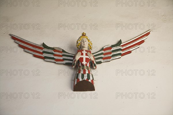 Wall mounted angel carving in Holy Trinity church Blythburgh Suffolk England