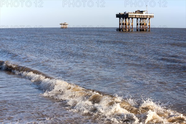 Offshore water intake and outlet towers supply cooling water to Sizewell nuclear power station, near Leiston, Suffolk, England, United Kingdom, Europe