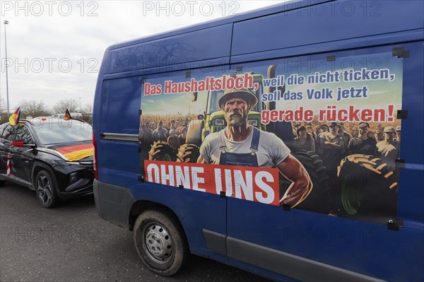 Poster criticising the government on a van, budget deficit, farmers' protests, demonstration against the policies of the traffic light government, abolition of agricultural diesel subsidies, Duesseldorf, North Rhine-Westphalia, Germany, Europe