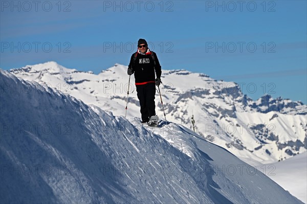 Snowshoe hiking in the Beverin nature park Park, Graubuenden, Switzerland, Europe