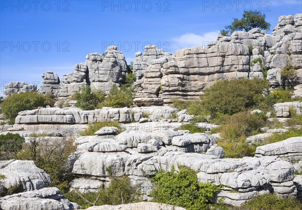 Dramatic limestone scenery of rocks shaped by erosion and weathering at El Torcal de Antequera national park, Andalusia, Spain, Europe