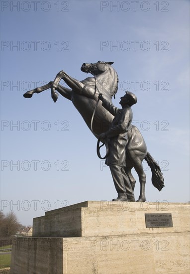 The Newmarket stallion sculpture by Marcia Astor and Allan Sly 2000 near the National Stud, Newmarket, Suffolk, England, United Kingdom, Europe