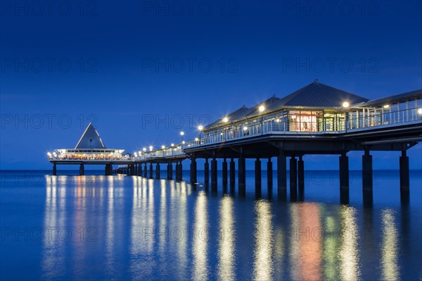 Heringsdorf Pier, Seebruecke Heringsdorf illuminated at night in the Baltic Sea on the island of Usedom, Mecklenburg-Vorpommern, Germany, Europe