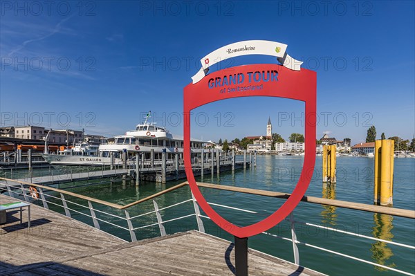 Excursion boat St. Gallen and advertising sign Grand Tour of Switzerland in the harbour, Romanshorn, Lake Constance, Canton Thurgau, Switzerland, Europe